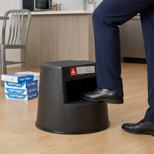 Person stepping onto a black Globe 5250 mobile step stool next to stacks of copy paper for scale.