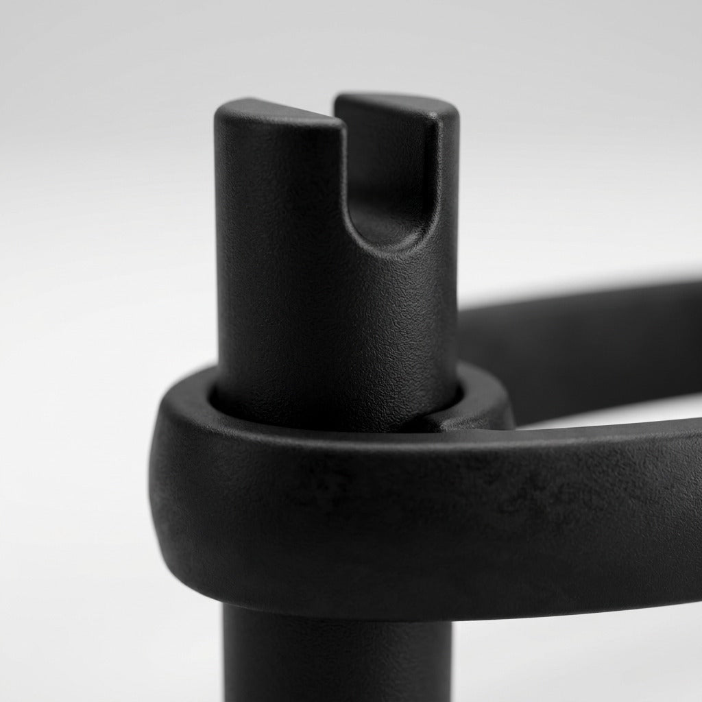 Macro detail of black BouncyBand for chairs, showing the durable textured rubber and secure bracket.