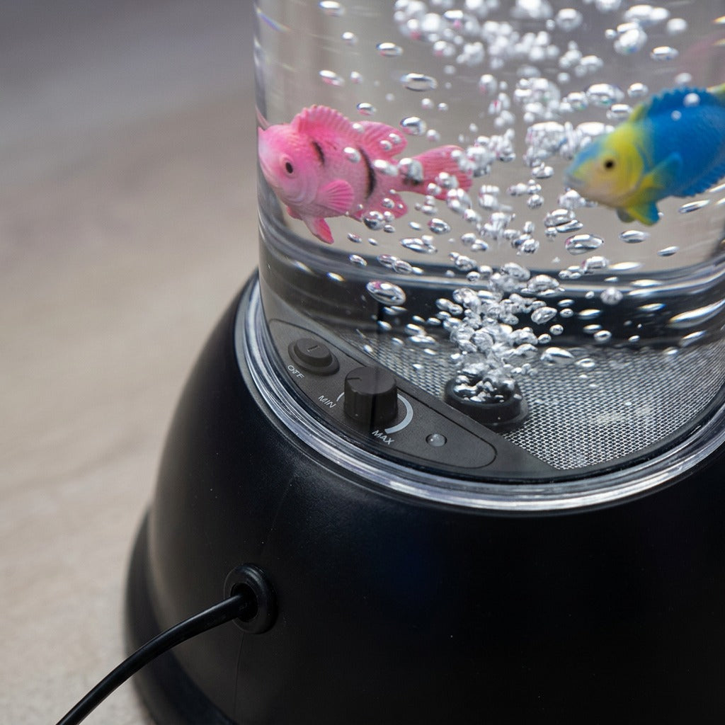 Macro view of fdmt Bubblebeam base showing the bubble intensity dial, power switch, and rising bubbles.