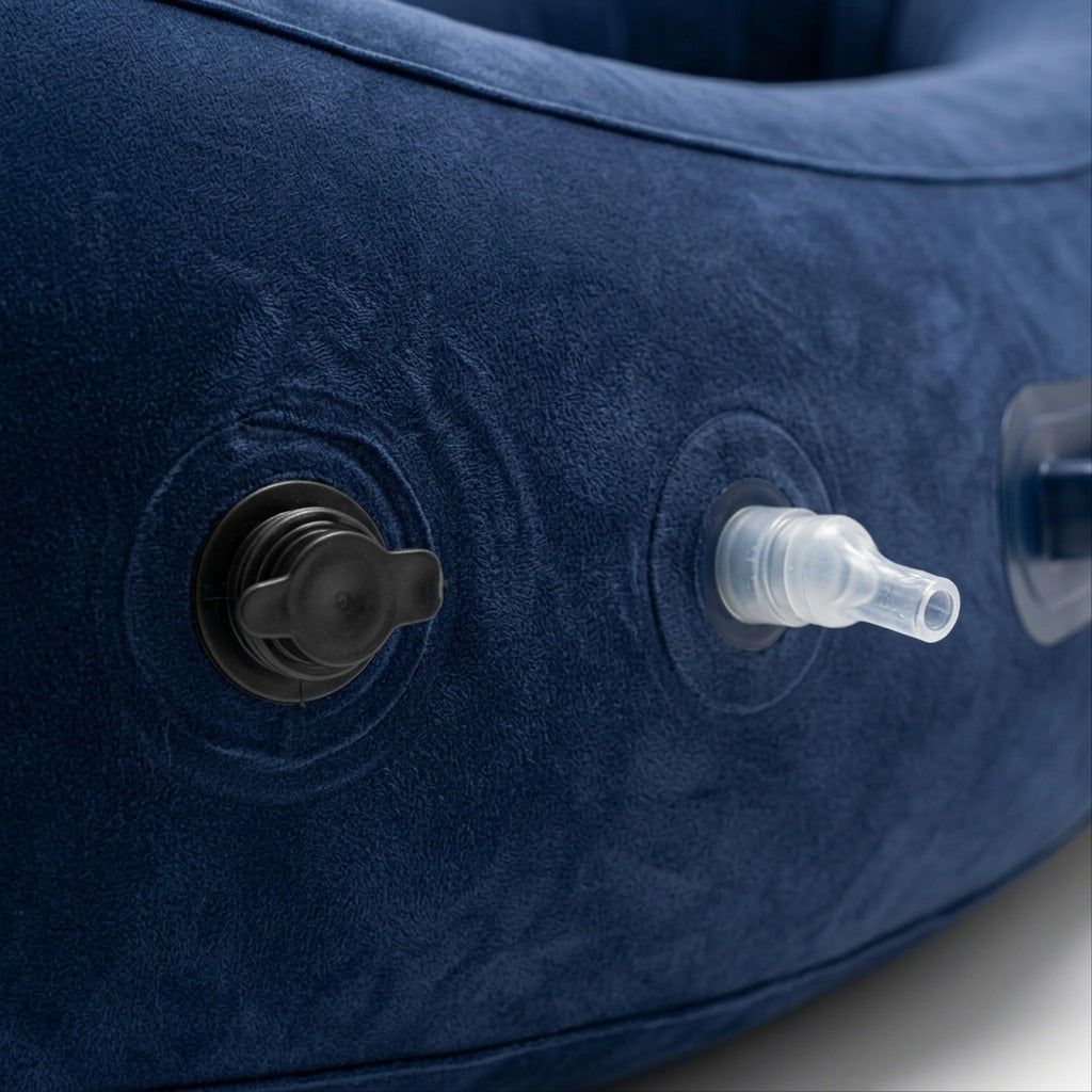 Macro detail of blue fdmt Inflatable Peapod showing soft flocked texture and air valve nozzles.