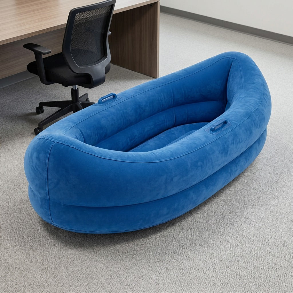 Blue 60-inch fdmt Inflatable Sensory Pod on a carpeted floor next to an office desk and chair.