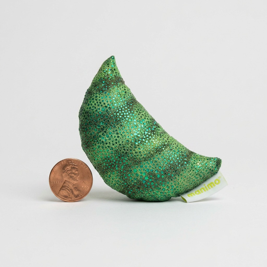 Macro photograph focusing on the green sparkling mesh fabric and stitching of the fdmt manimo Half Moon Ball.