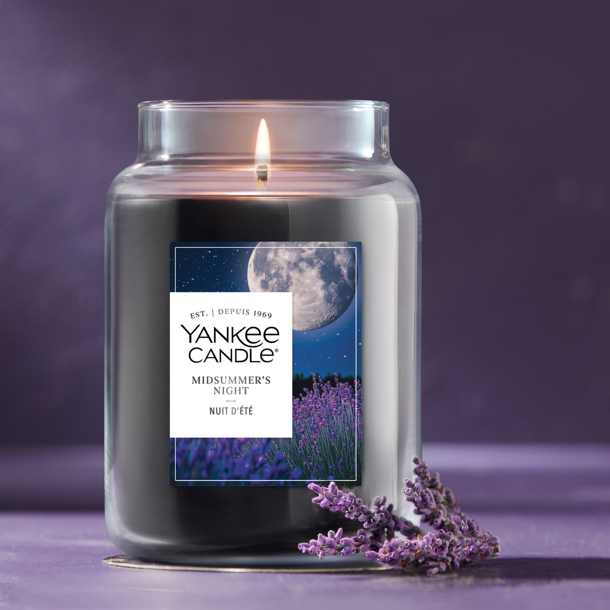 Yankee Candle Midsummer's Night Large Jar lit, with lavender